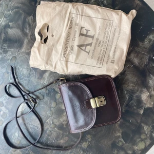 Real Leather Bag From Florence - I bought this bag in Italy. It is made of real Leather, and the color is really pretty.