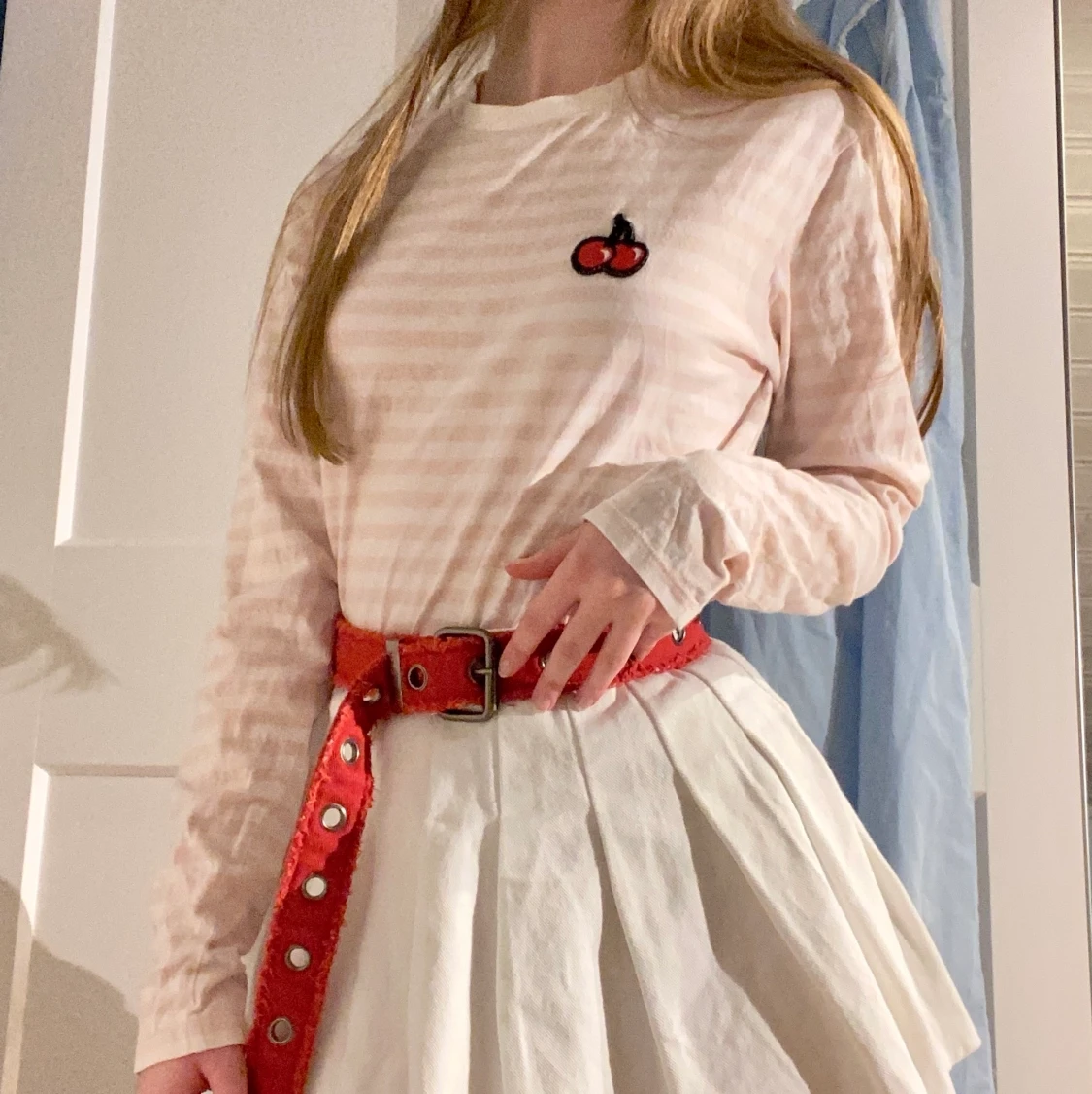 Gullig rosa-vitrandig tröja