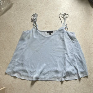 Ljusblått linne - Ljusblått linne från Topshop. 