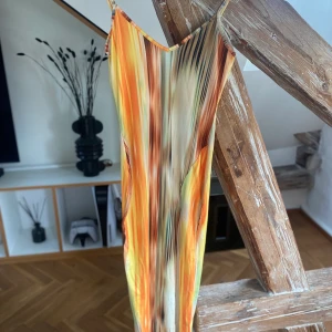 Beautiful dress  - Size s.  Has a nice slit for the leg 