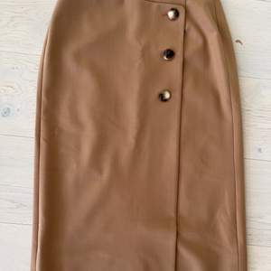 Stylish knee length pencil skirt Never worn, with tags
