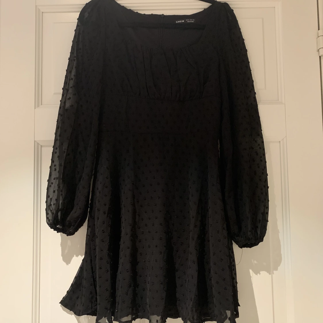 Långärmad klänning