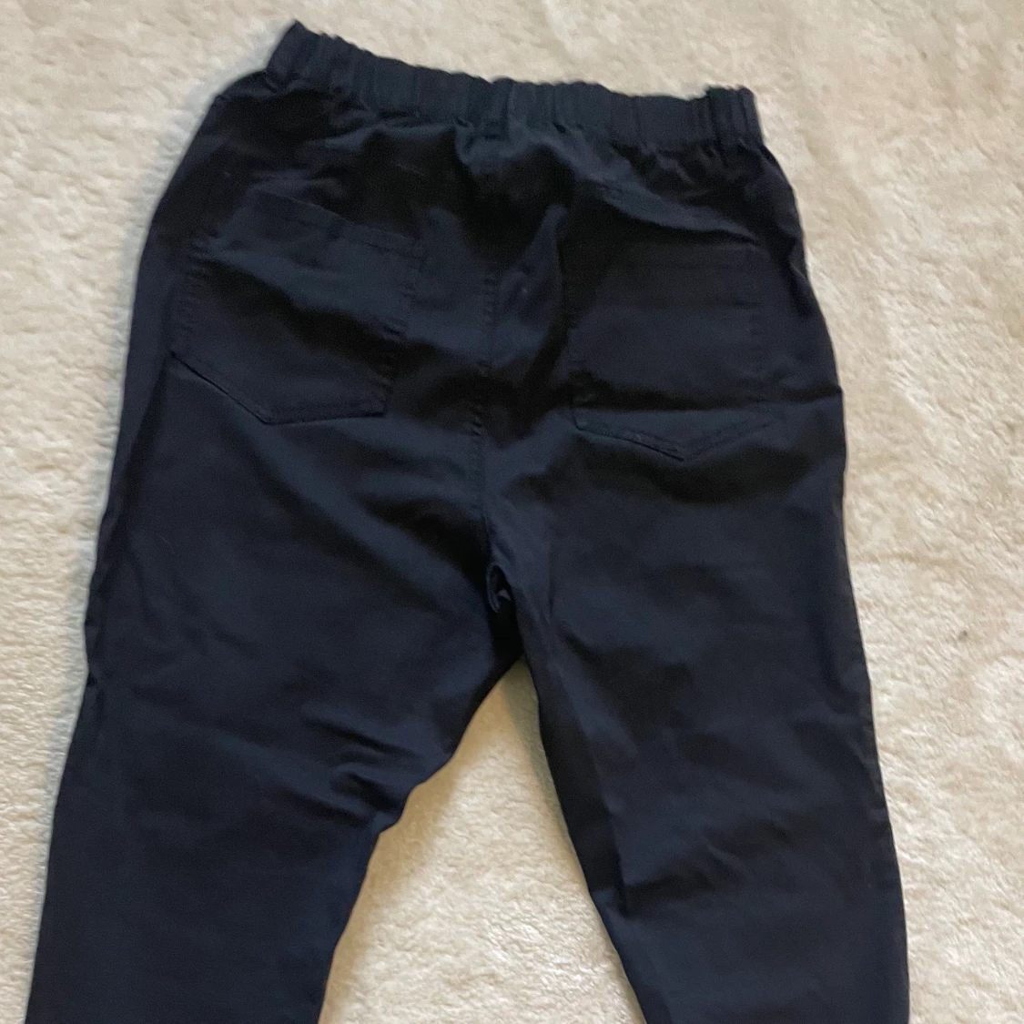 Svarta byxor  - 91