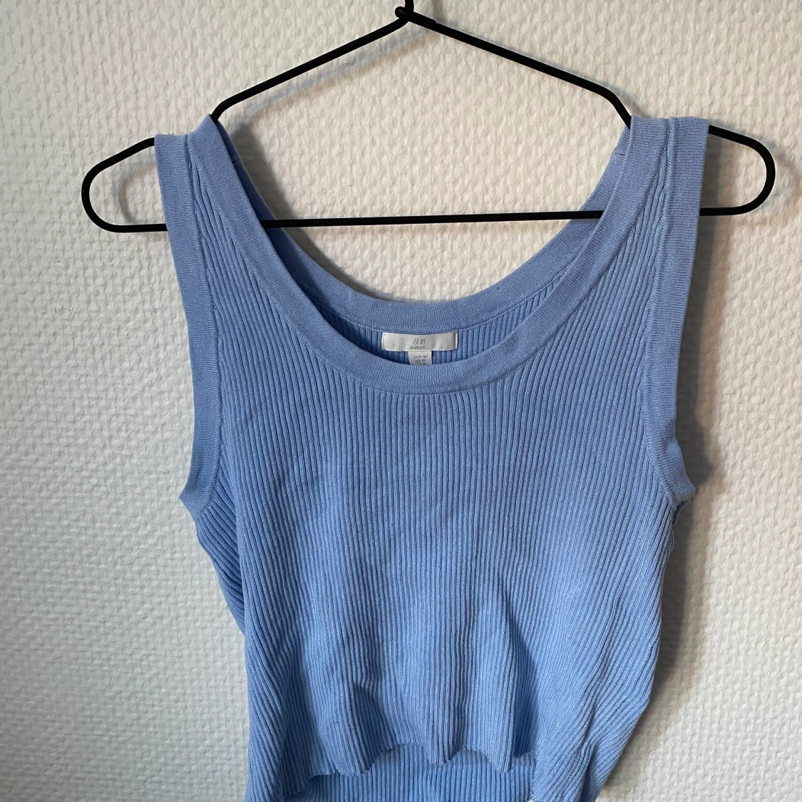 Kroppad blått linne