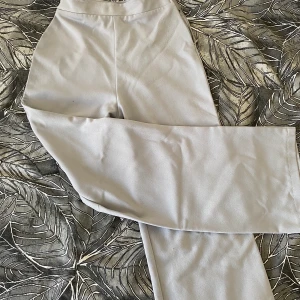 Tygbyxor grå - Storlek 34, har använt 2-3 gånger 