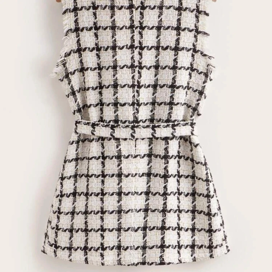 Svart/vit väst  - 90