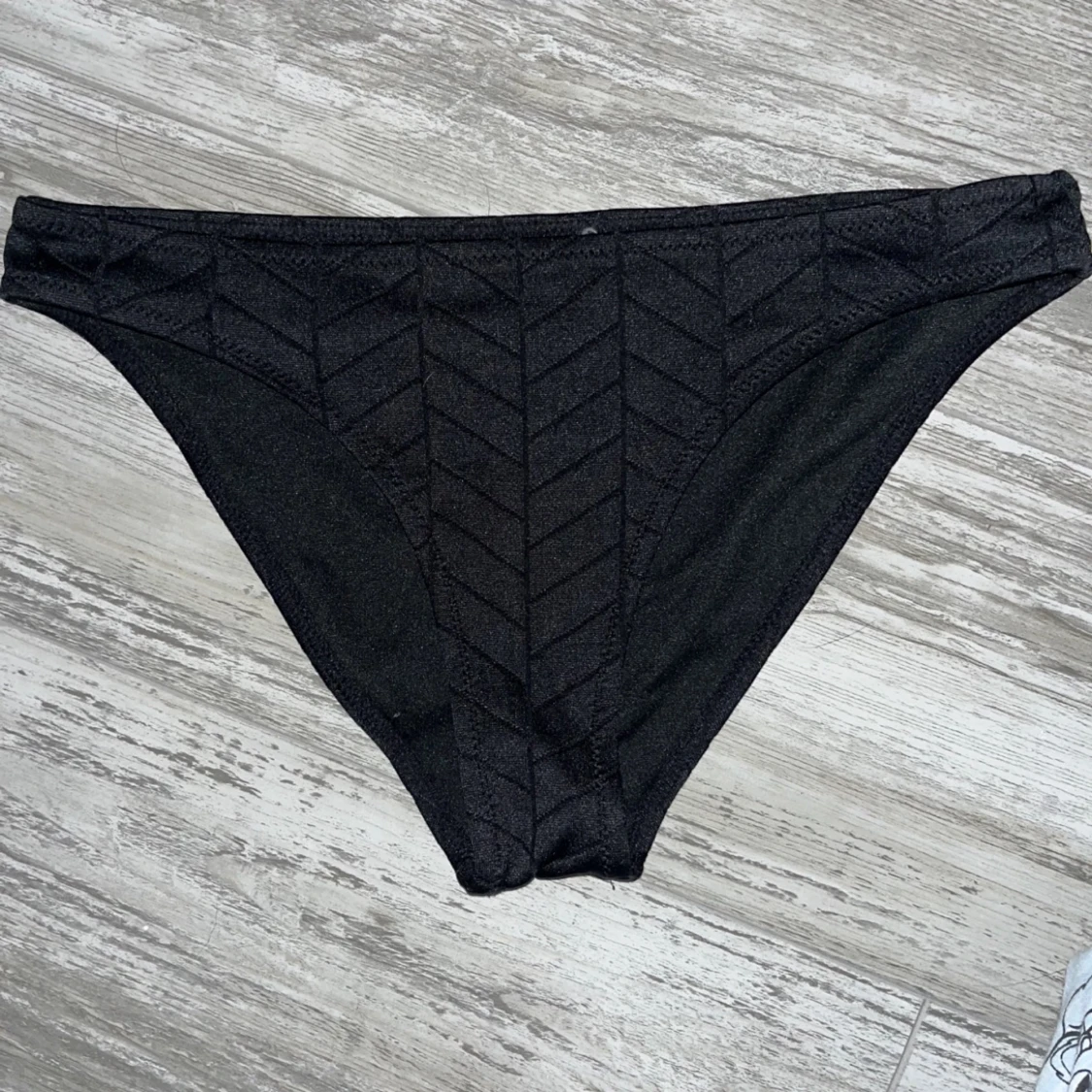 Svart mönstrad bikiniunderdel