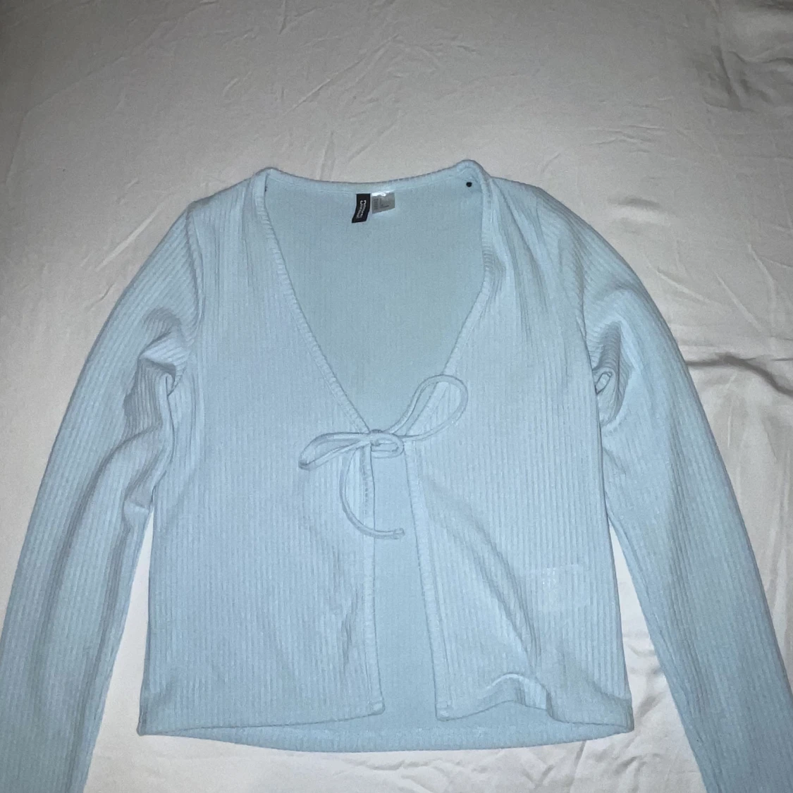 Kofta  från H&M, storlek S