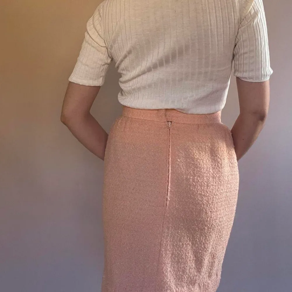 Vintage Celine Woven Boucle Skirt with 2 Front Pockets. Back Zip Closure. Sewn in Lining. Excellent Condition  Made in France.  Tagged Size 38.  94% Wool/ 6% Acetate.   50 CM/ 19.7 IN Length 64 CM/ 25.2 IN Waist 80 CM/ 31.5 IN Hips . Kjolar.
