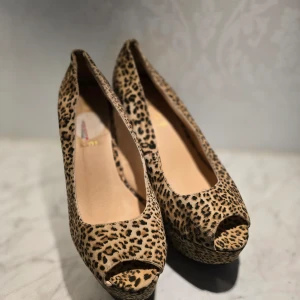 Leopard skor  - Sparsam använda 