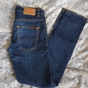 Nudie Grim Tim - Nudie Grim Tim Fint skick  Storlek 28/32