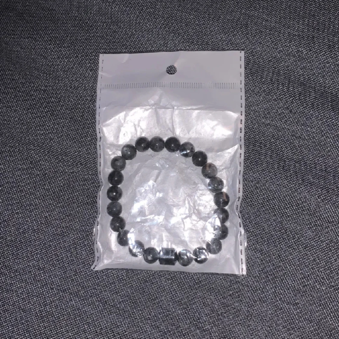 Svart ” grisch ” pärlarmband