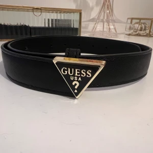Guess bälte - Äkta Guess bälte i storlek XS (80 cm). Endast använts ett fåtal gånger.
