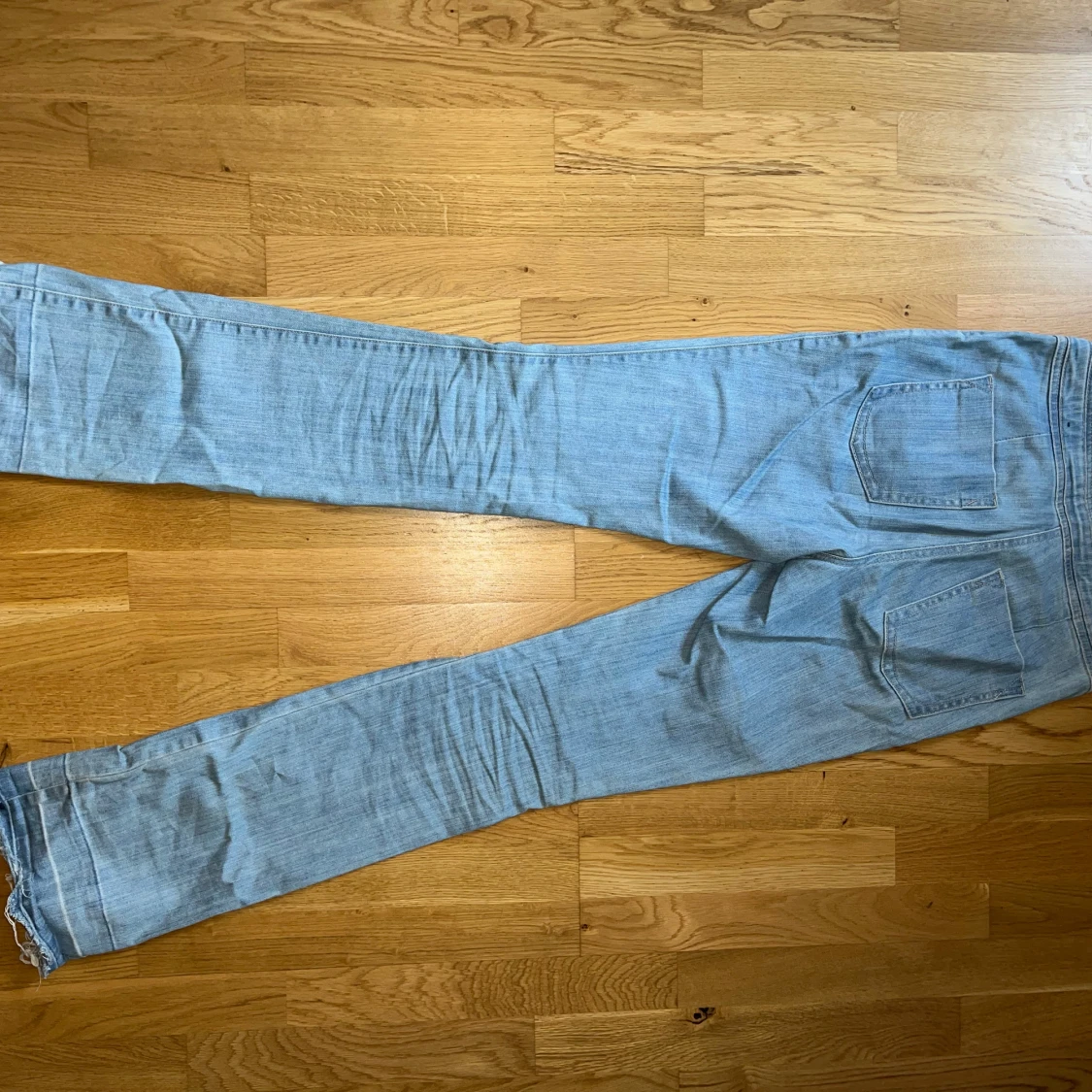 Ljusblå bootcut jeans  - 90