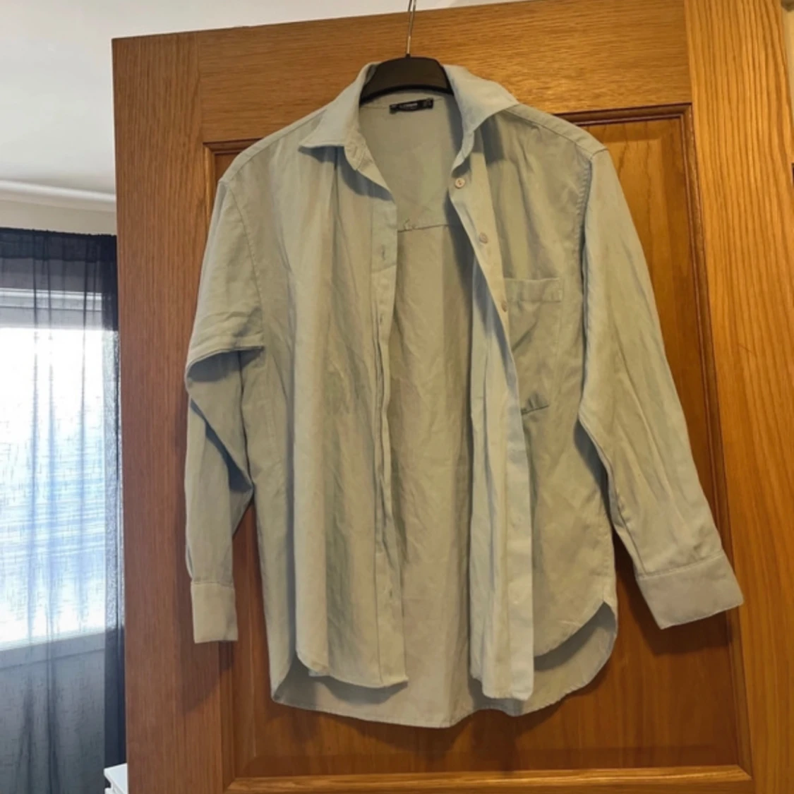 Ljusblå skjorta med diamanter  - 90