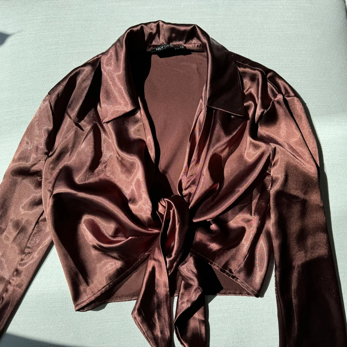 Blus med knytning  - 91