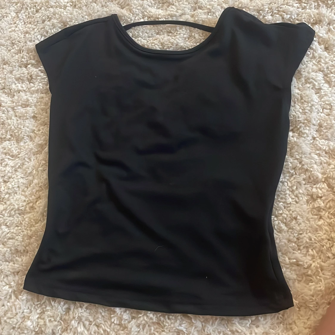  topp med öppen rygg