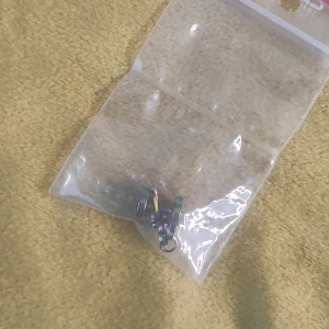 Fake plugg- Celtic Kors Flerfärgad  - Exakt som det står på titeln . Den är oöppnad!