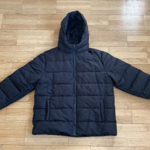 Black puffer jacket (braska) - Jacket’s material is 100% polyester Almost new, hasn’t been worn much 