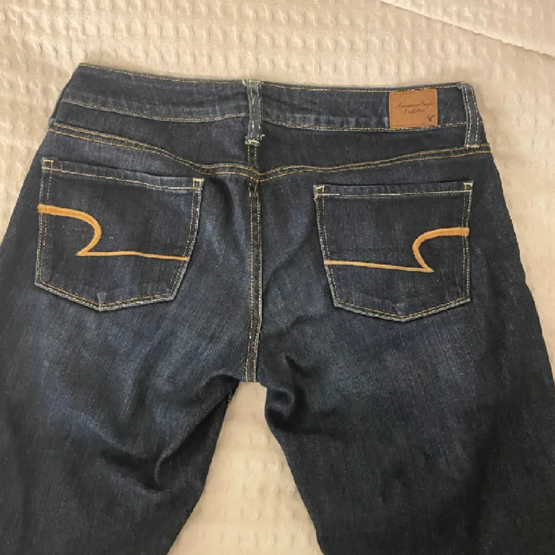 lågmidjade jeans