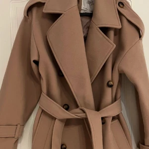 Kappa  - Lite för stor för mig helt oanvänd 