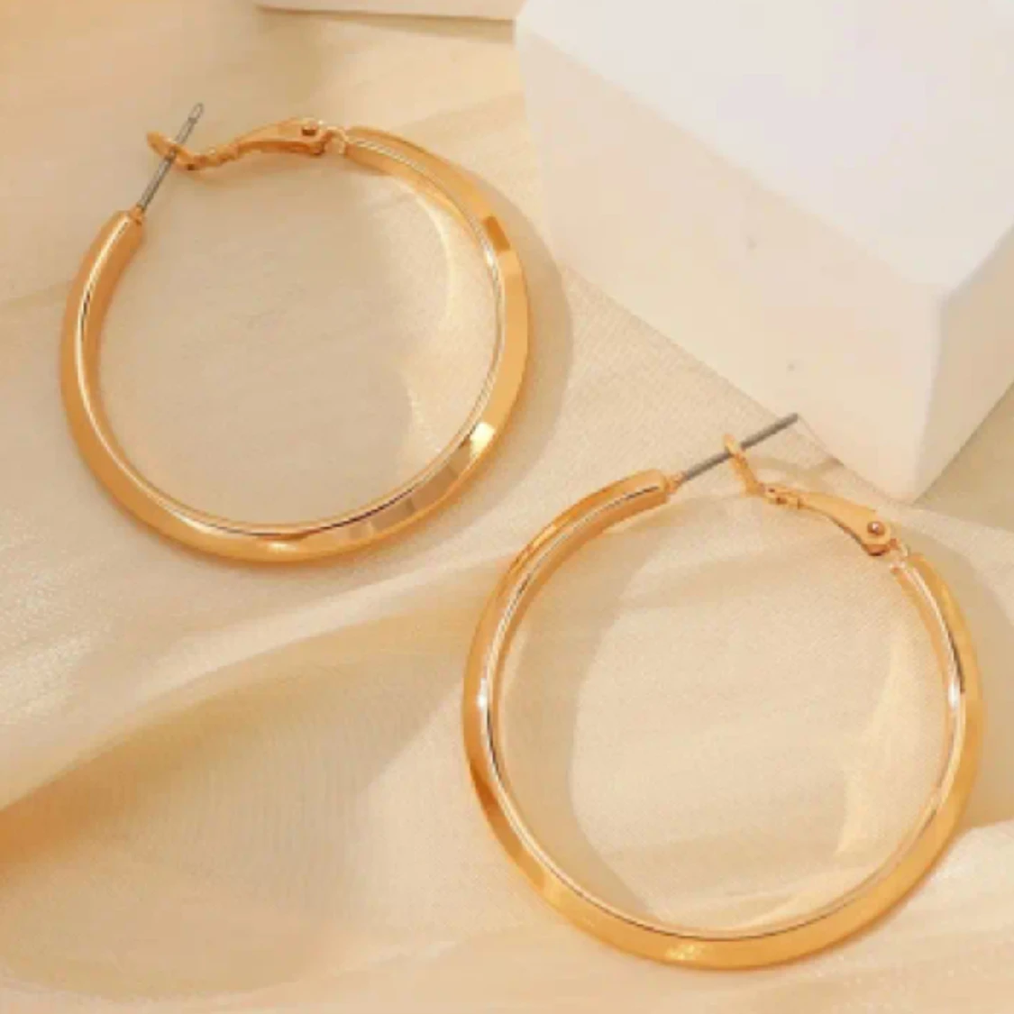 Örhängen runda guldiga