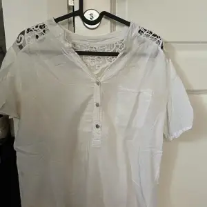 Transparent short sleeved summer shirt. Worn many times but still in great shape, with barely visible imperfections 