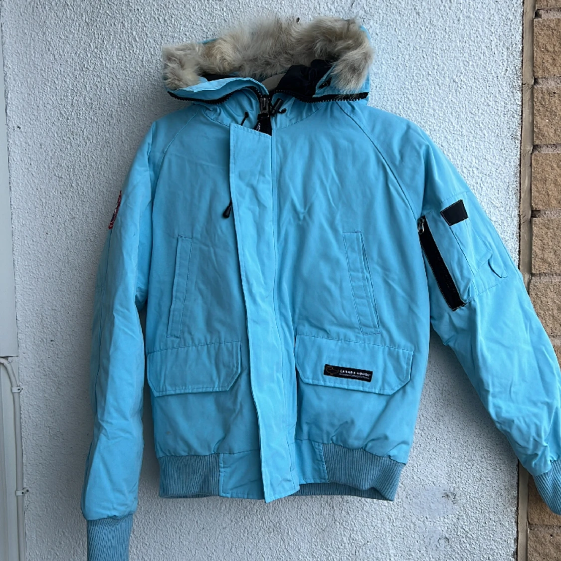 Ljusblå varm vinterjacka