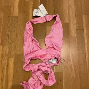 Topp - En jätte fin rosa topp med prislapp på!