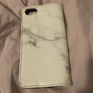 Mobilskal  - Ett mobilskal för iPhone 8/se 