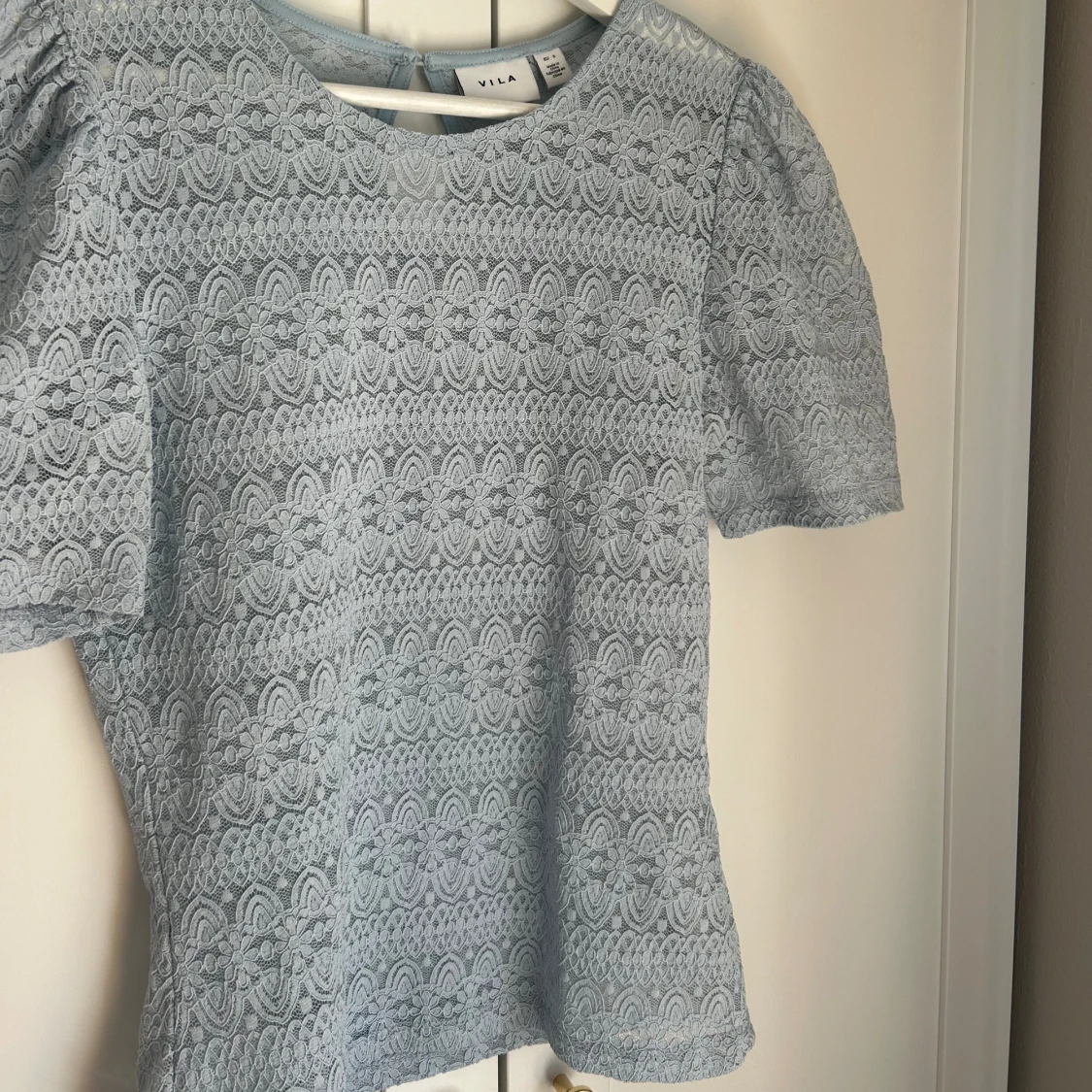 Ljusblå spetströja - 91