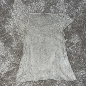 Stickad topp - Säljer denna supersöta somriga topp från Saint tropez i storlek S🪽🤍