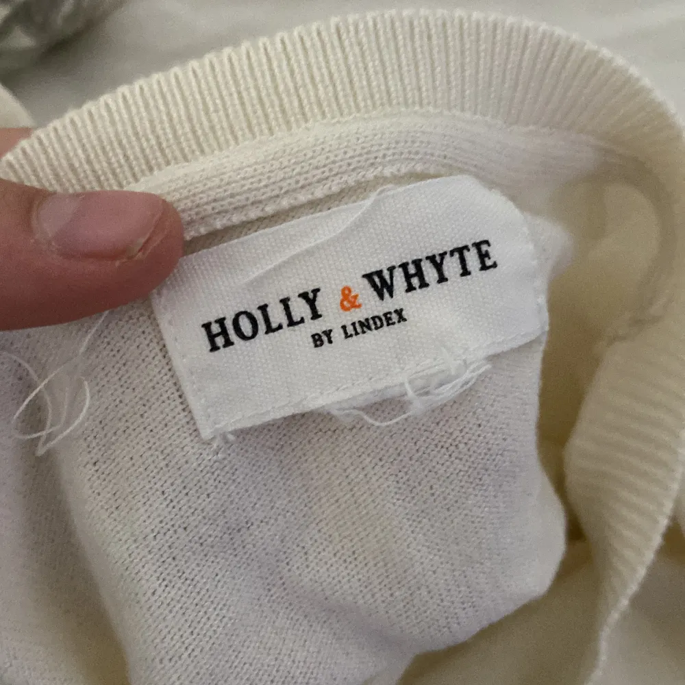 En snygg knapp tröja från Holly whyte. Blusar.