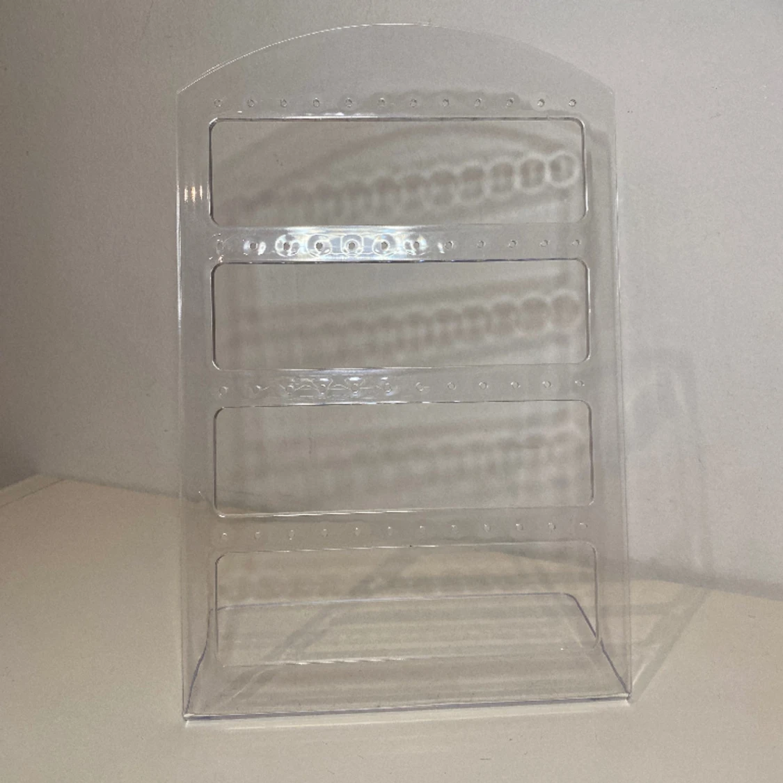 Ställning för örhängen - 90