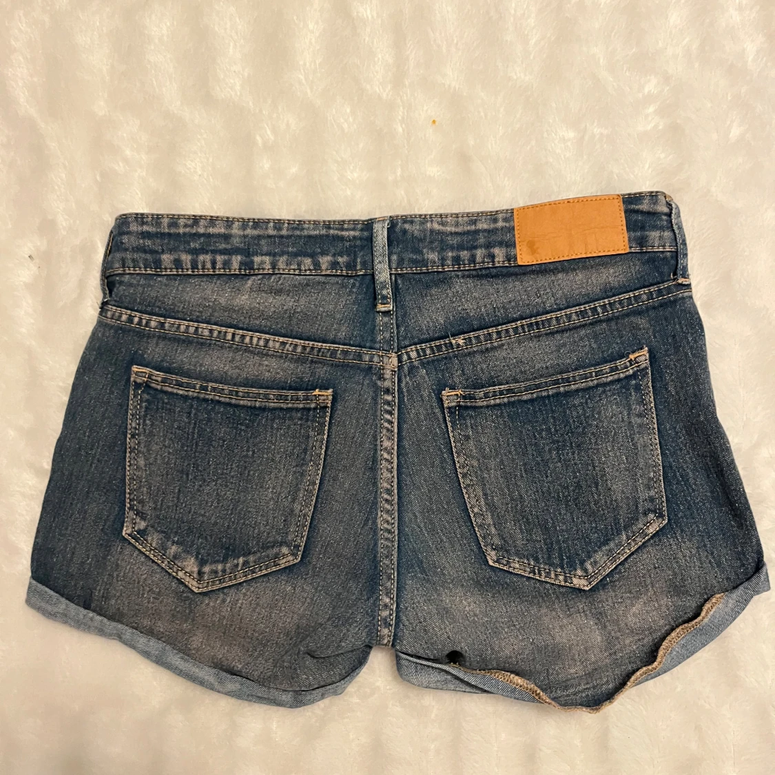 Blåa lågmidjade jeansshorts  - 90