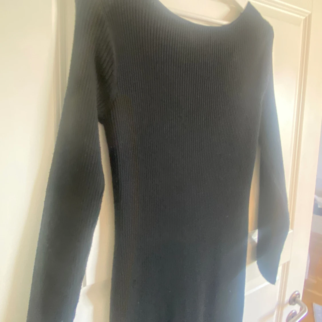 Svart stickad klänning - 91