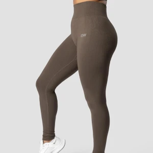 Iciw tights  - Icaniwill ribbed define seamless, jätte fint skick! storlek XS i färgen dark sand 