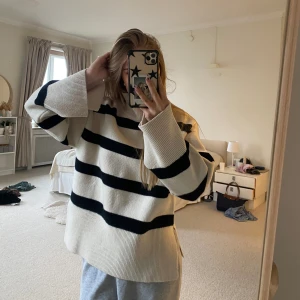 White Sweater with black stripes  - Sweater with stripes. Never been worn and in perfect condition. 