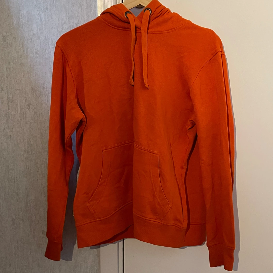 En orange hoddie