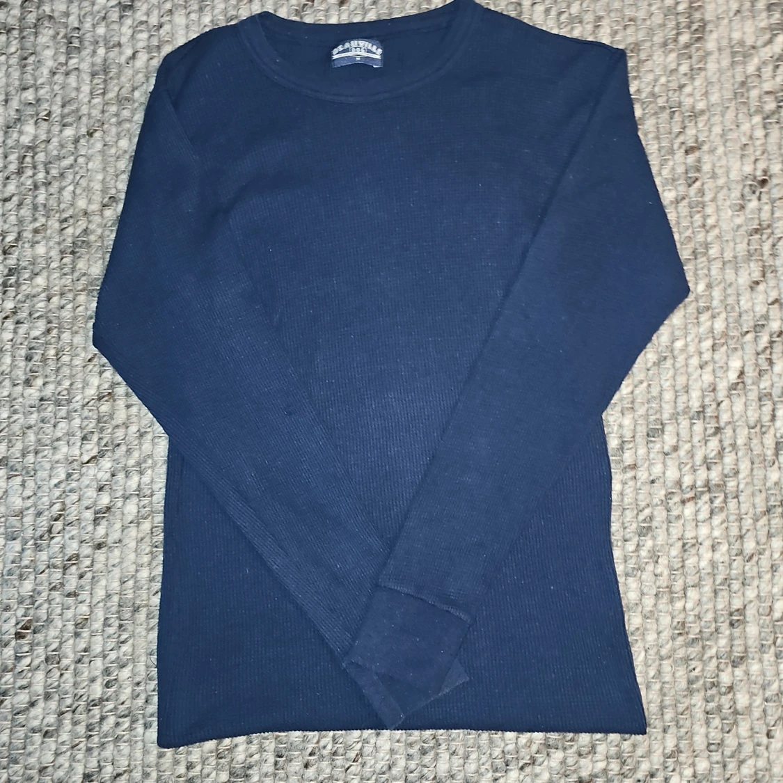 Mörkblå ribbad tröja från Deauville