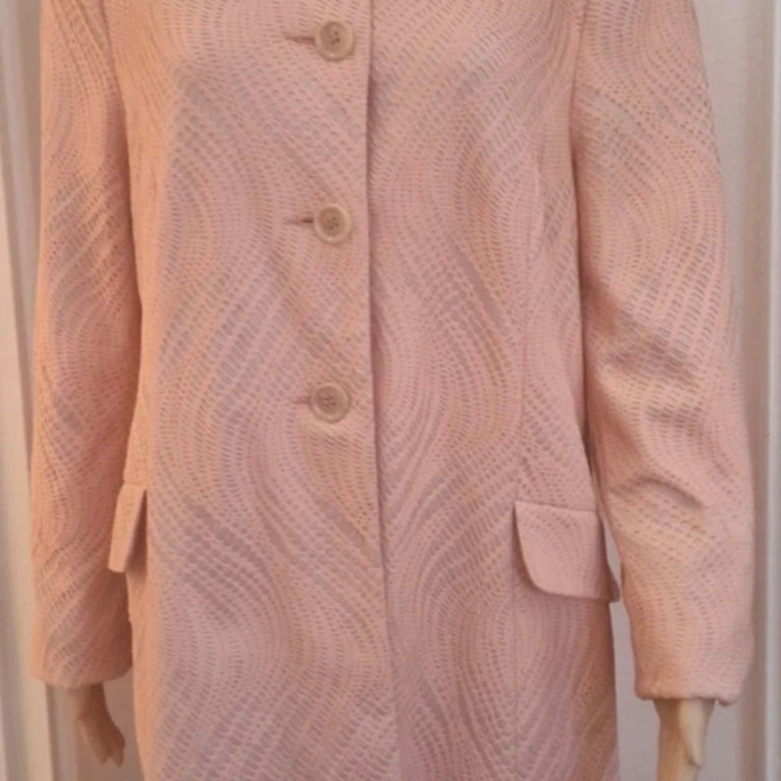 Ljusrosa kappa från Atmosphere