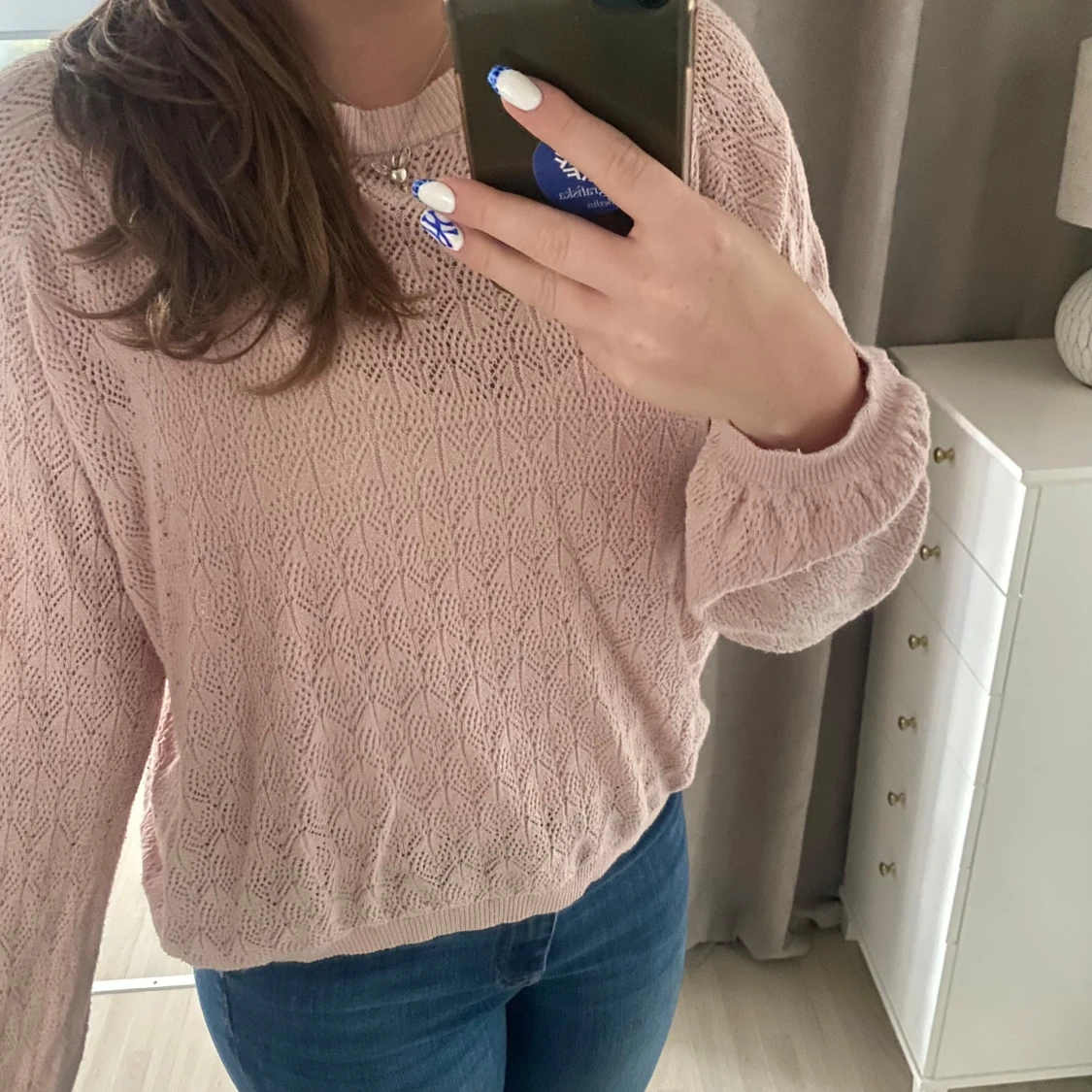 Ljusrosa stickad tröja med mönster