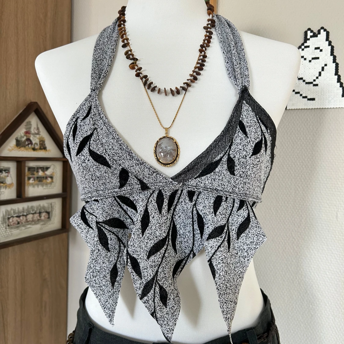 Assymetrisk halterneck topp