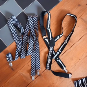 hängseln - 2 st hängslen en med rutor och en med skellett på^^ 1 för 20 kr