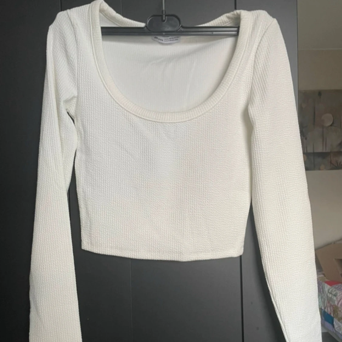 Vit u-ringad långärmad topp