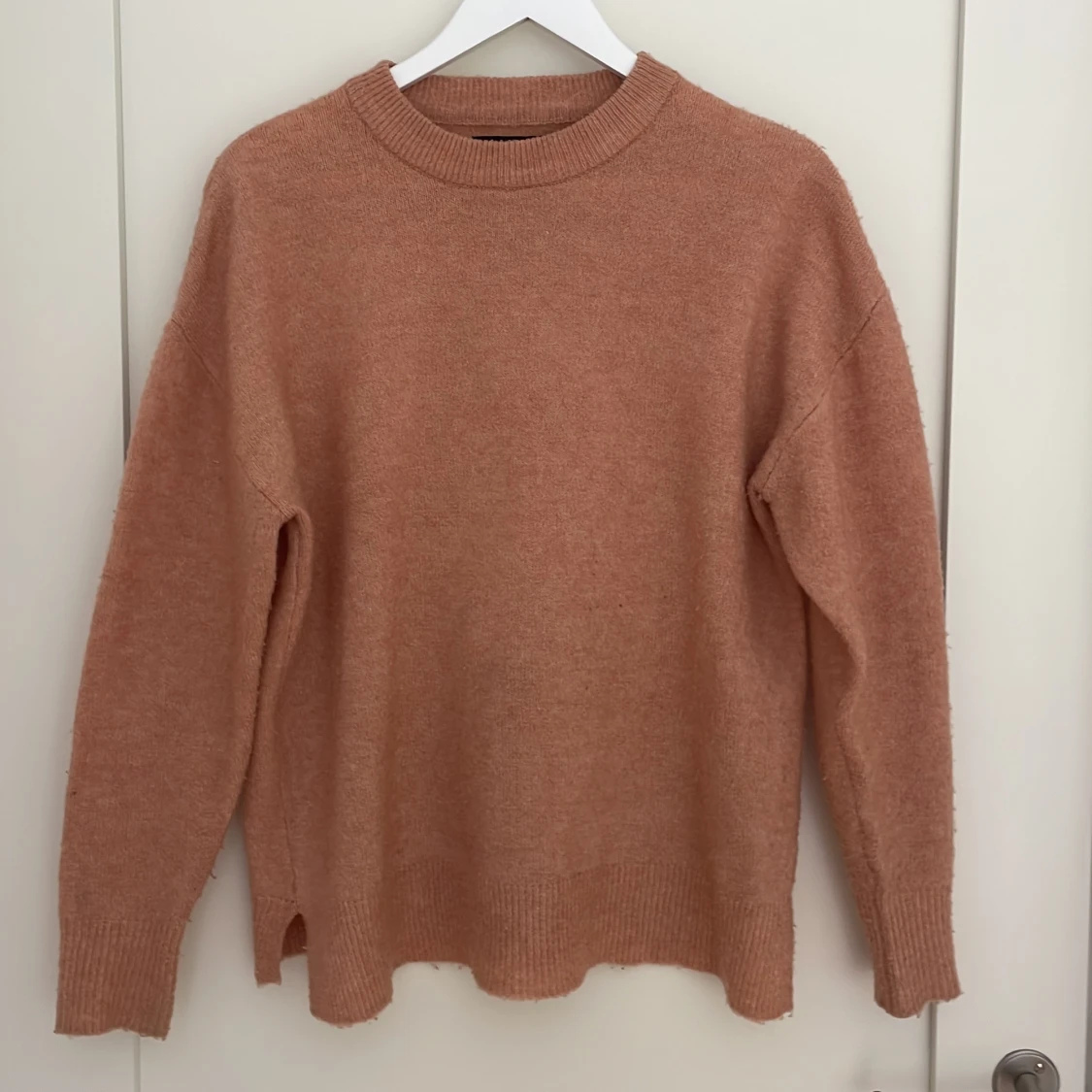 Rosa stickad tröja från Amisu