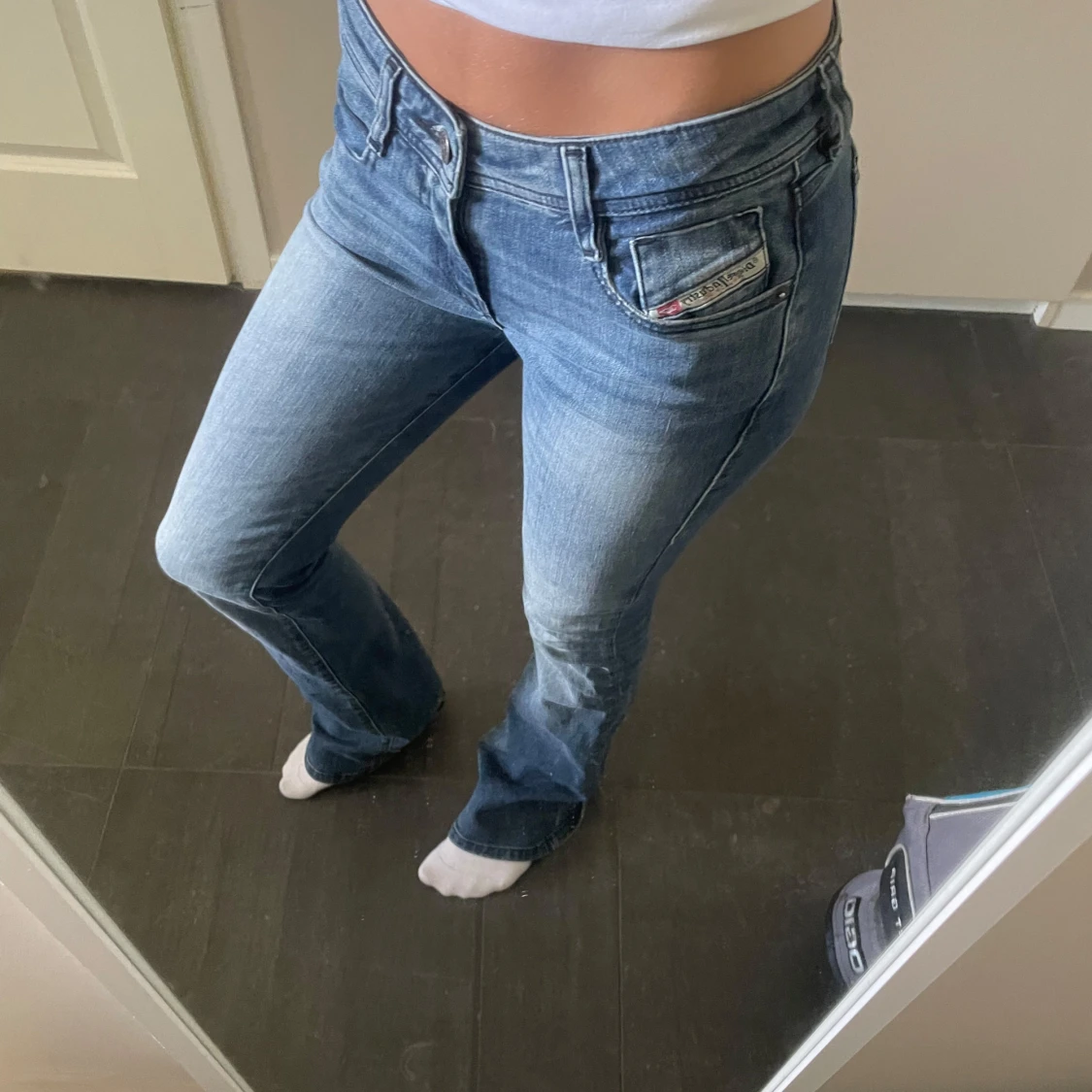 Blå low waist bootcut jeans från Diesel