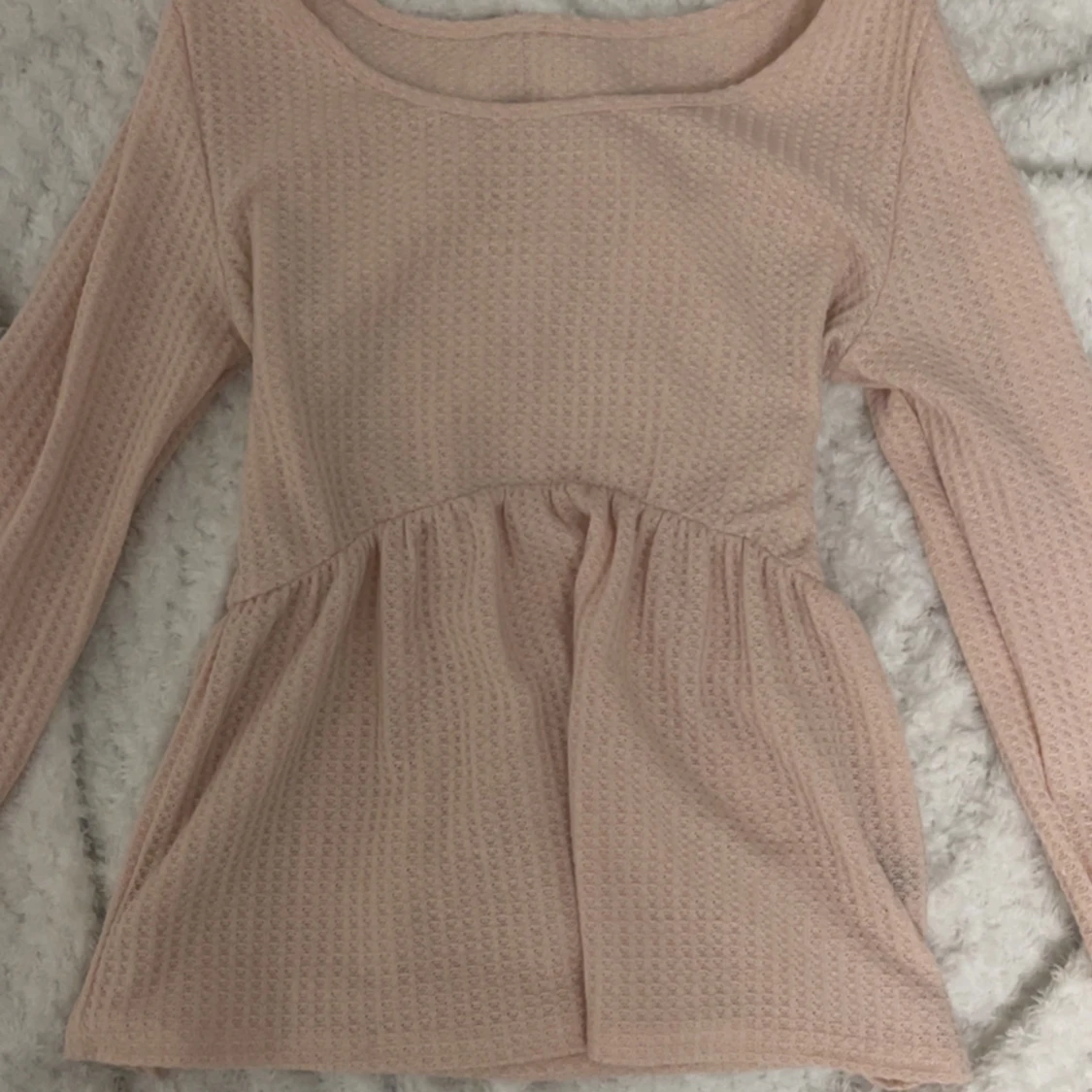 Ljusrosa oanvänd långärmad blus