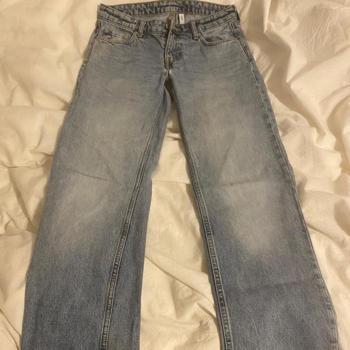 Ljusblå jeansbyxor - 1