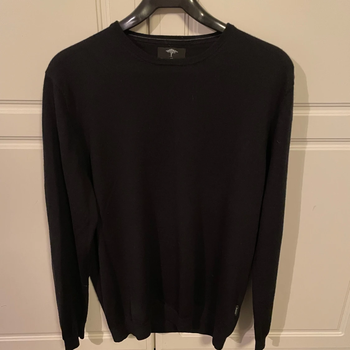 Svart merinoullströja